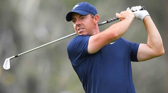 Rory McIlroy watches his shot on the 10th hole during the final round of the 2024 Genesis Invitational at Riviera Country Club in Pacific Palisades, Calif.